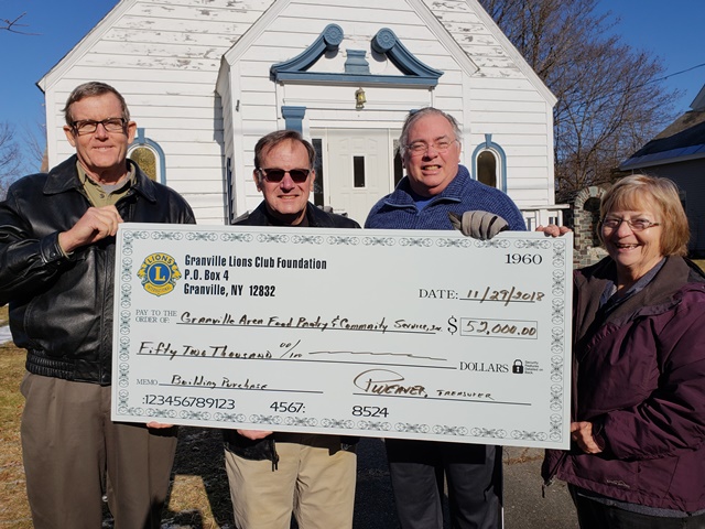 5c0e873229913 Granville Lions check presentation