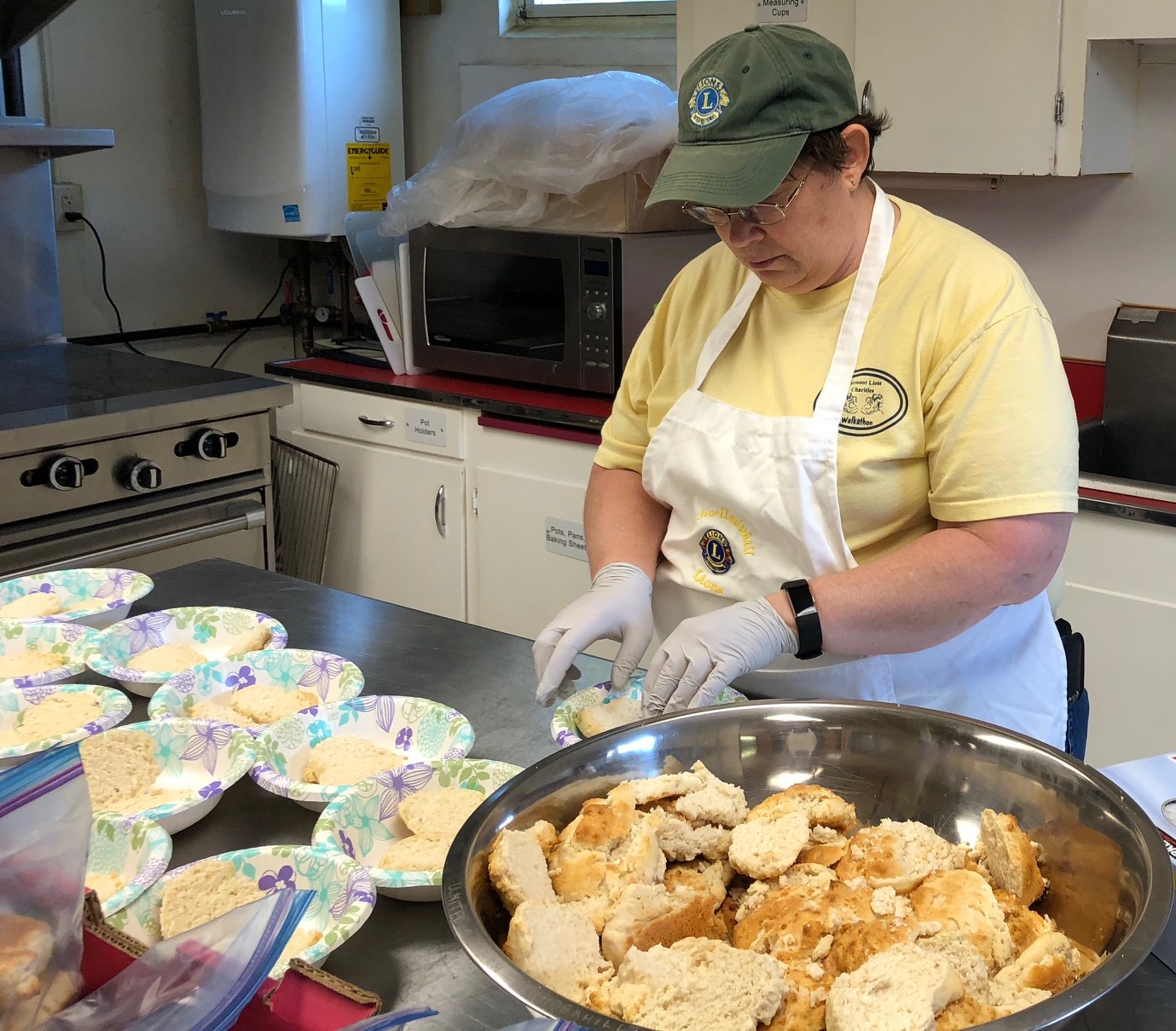 Lion Cindy Berg splitting biscuits